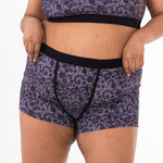 Close up crop of model wearing Stormy lace boxers