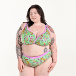 Molly is wearing a cottage core inspired bra and high rise briefs