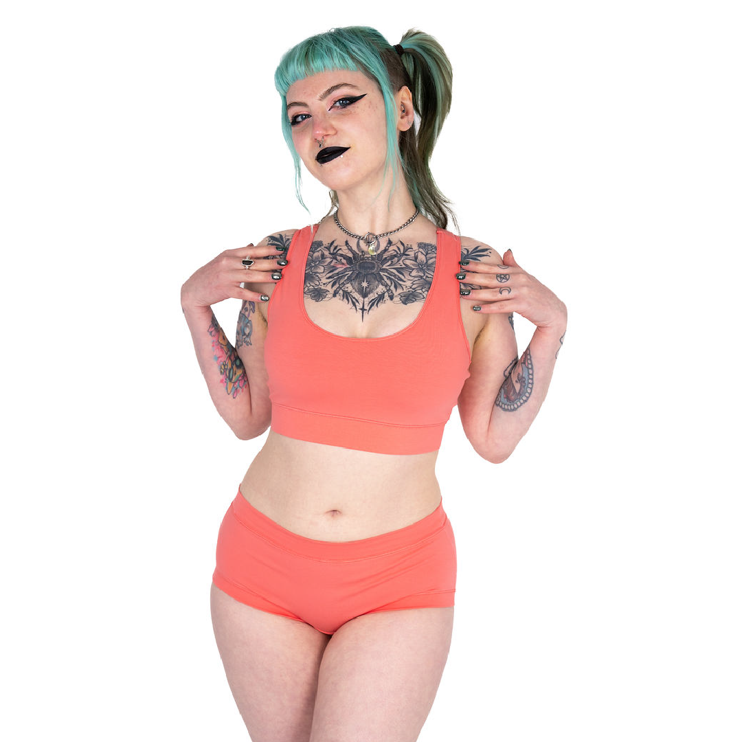 Faeryn is wearing a Coral racerback bralette and cotton briefs