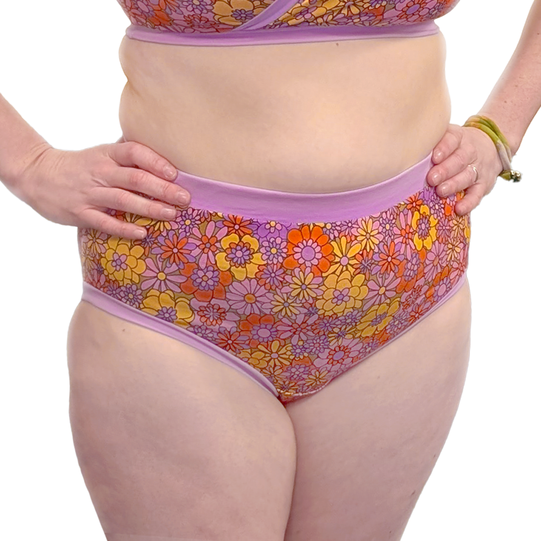 Jen is wearing Flora high rise briefs.