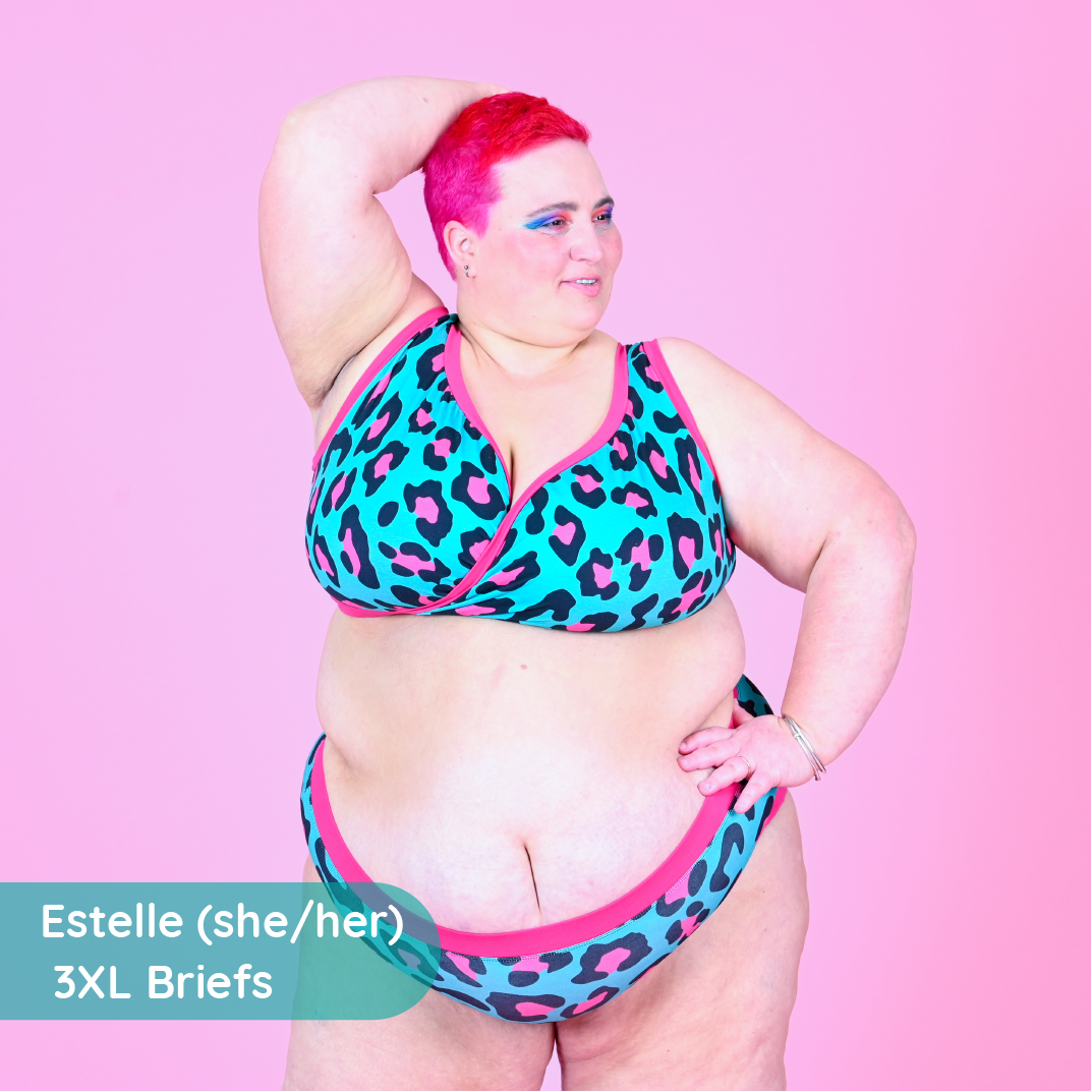 Estelle is wearing a teal and pink leopard print underwear set with high waist briefs