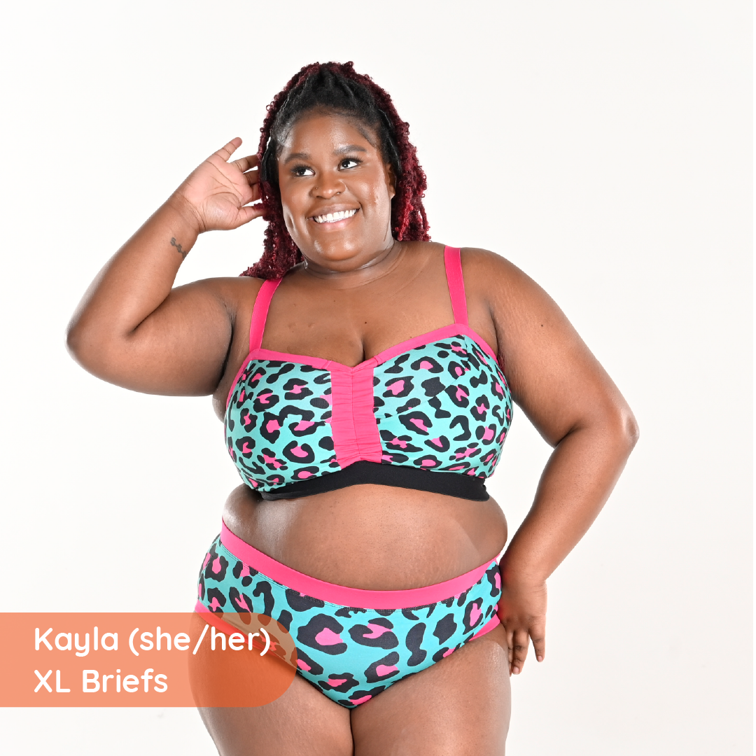 Kayla is wearing a non wired bra and high rise briefs in leopard print