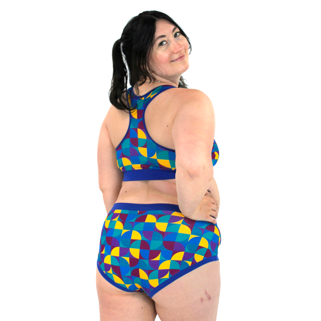 Back view of Becky wearing an Eclipse cotton racerback bralette and briefs