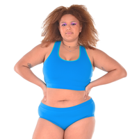 Tumi is wearing a Lagoon racerback bralette and briefs