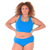 Tumi is wearing a Lagoon blue racerback bralette and mid rise briefs