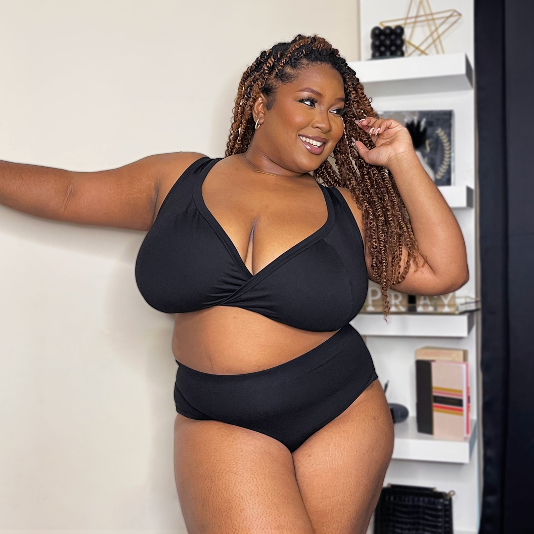 Tanesa is wearing a black non wired bra and high rise briefs