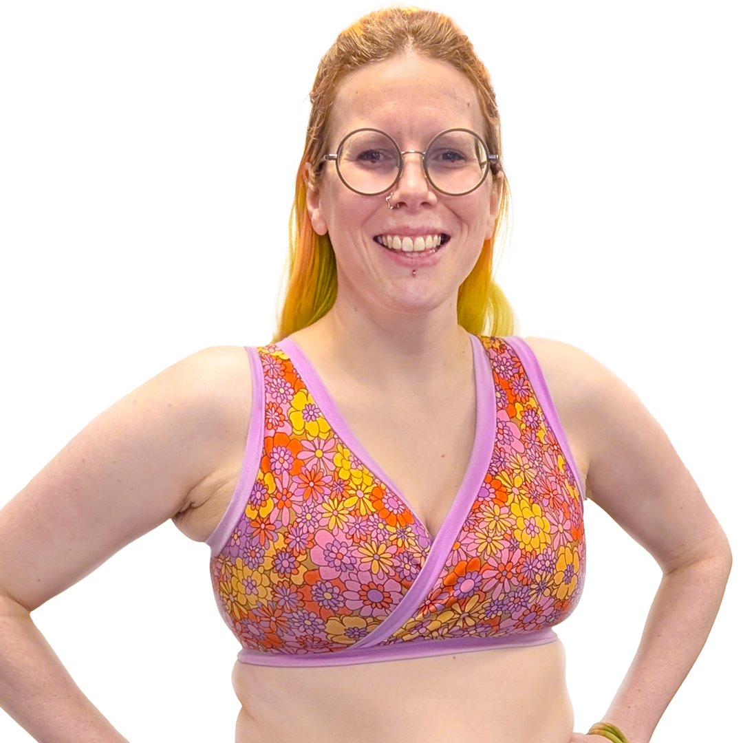 Jen is smiling and wearing a Flora Original Molke bra.