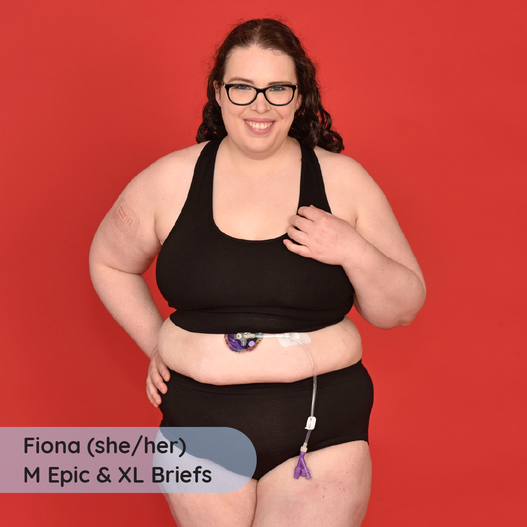 Fiona is wearing a black racerback bralette and high rise briefs