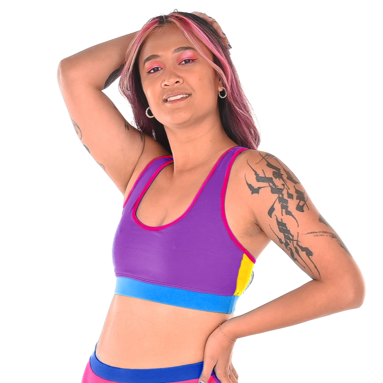 Sarah is wearing a Remix molke racerback bralette and high rise briefs