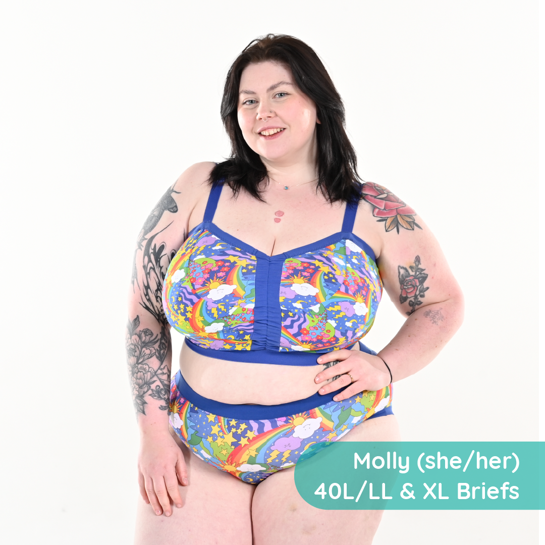 Molly is wearing a retro rainbow bra and briefs