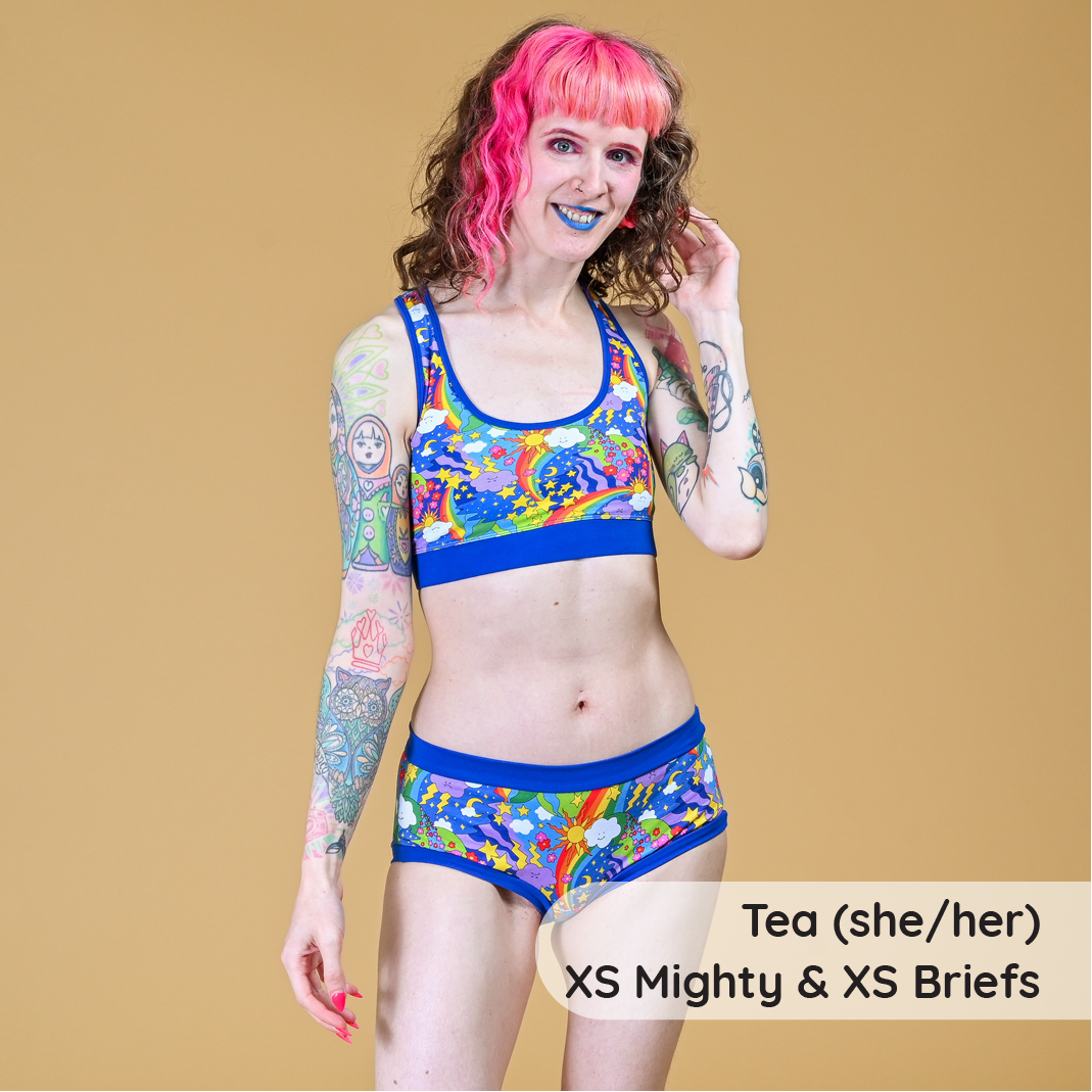 Tracy is wearing cotton rainbow briefs and bralette