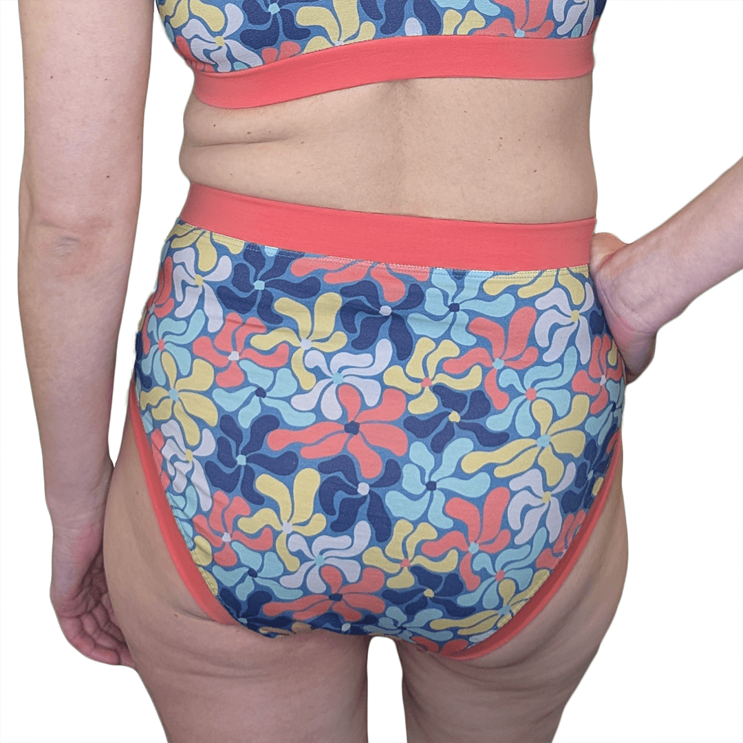 Back cropped view showing model wearing high rise wavy flowers briefs