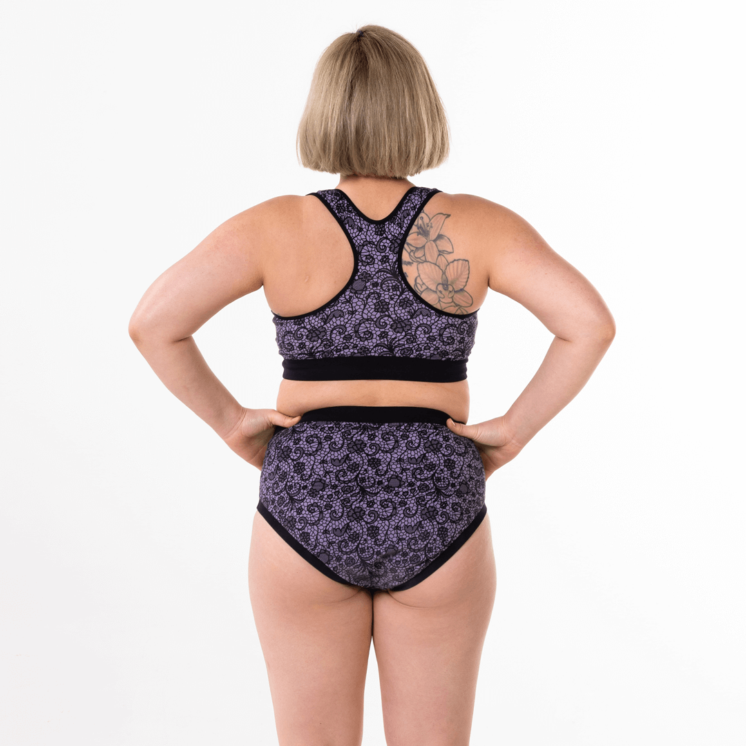 Back view of Jacqueline wearing a racerback bralette and briefs