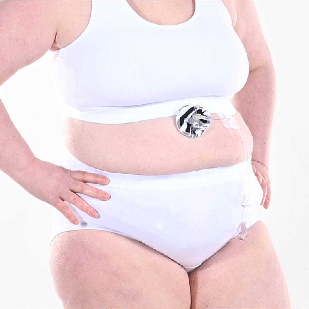 Fiona is wearing white high rise briefs and bralette