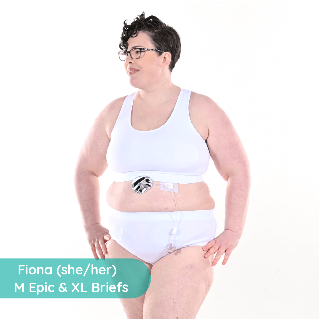 Fiona is wearing a fuller bust white bralette and high rise white briefs
