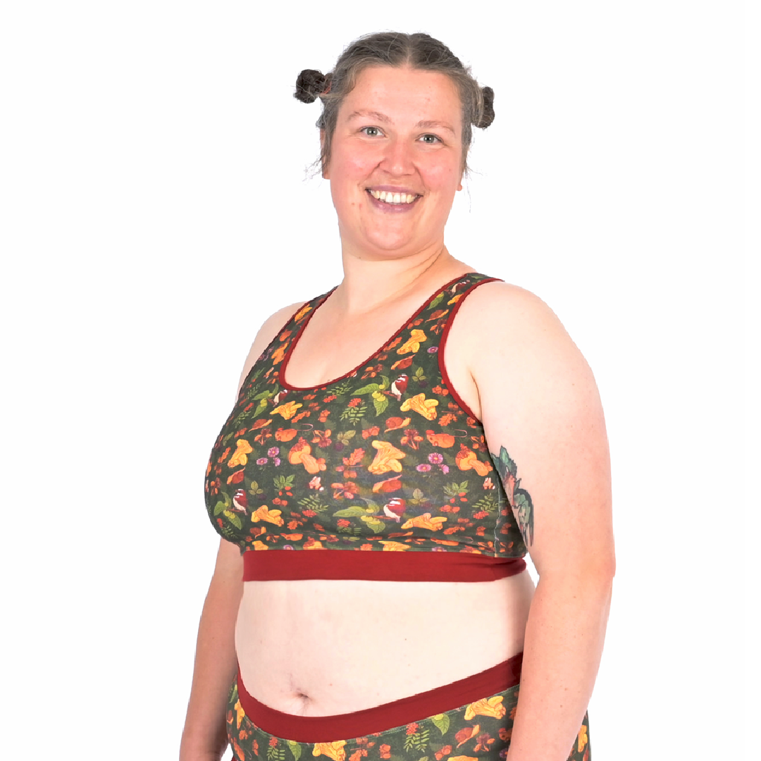 Katy is wearing a fuller bust forager bralette in a woodland autumnal theme