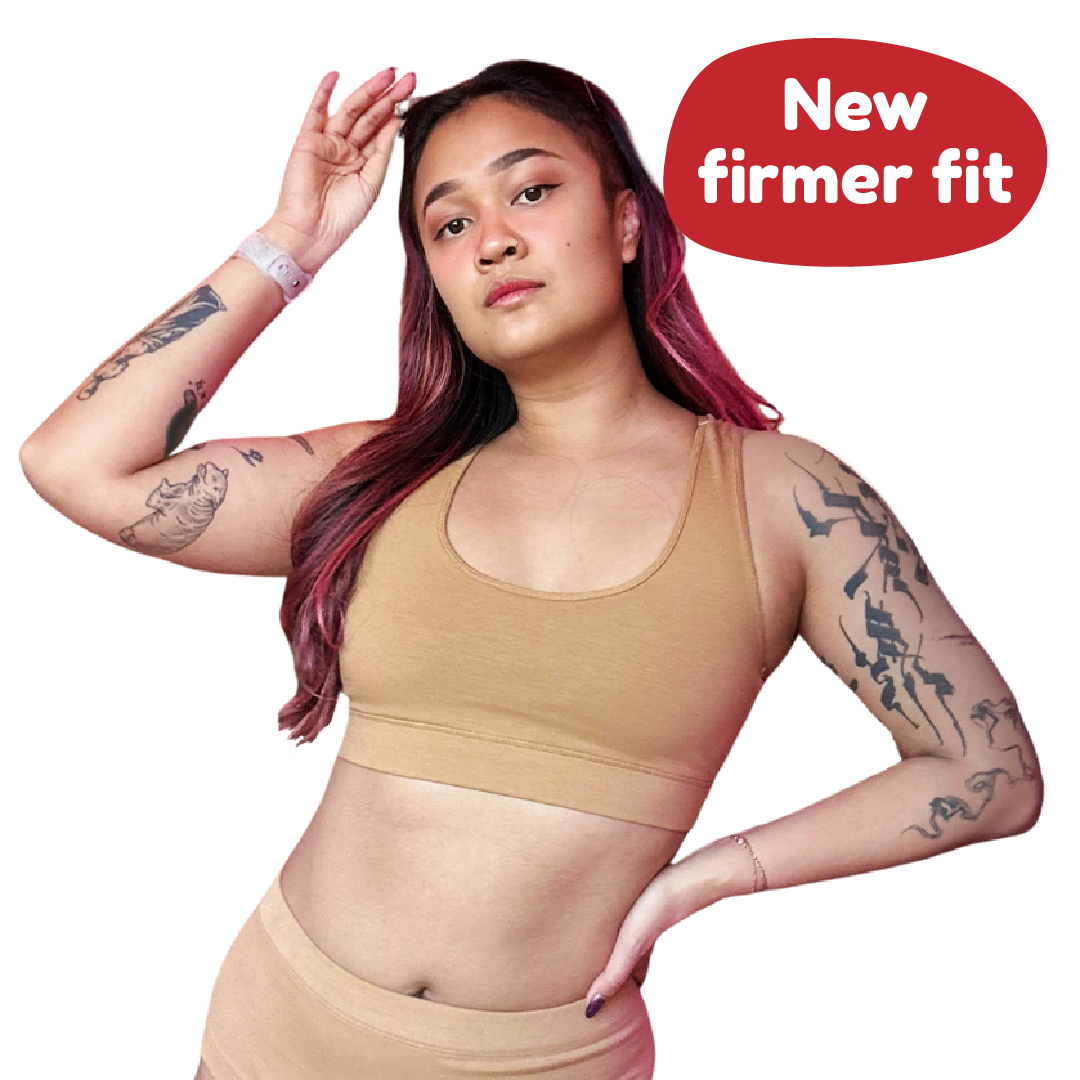 Sarah is wearing a  firmer fit nude skin tone cotton racerback bralette