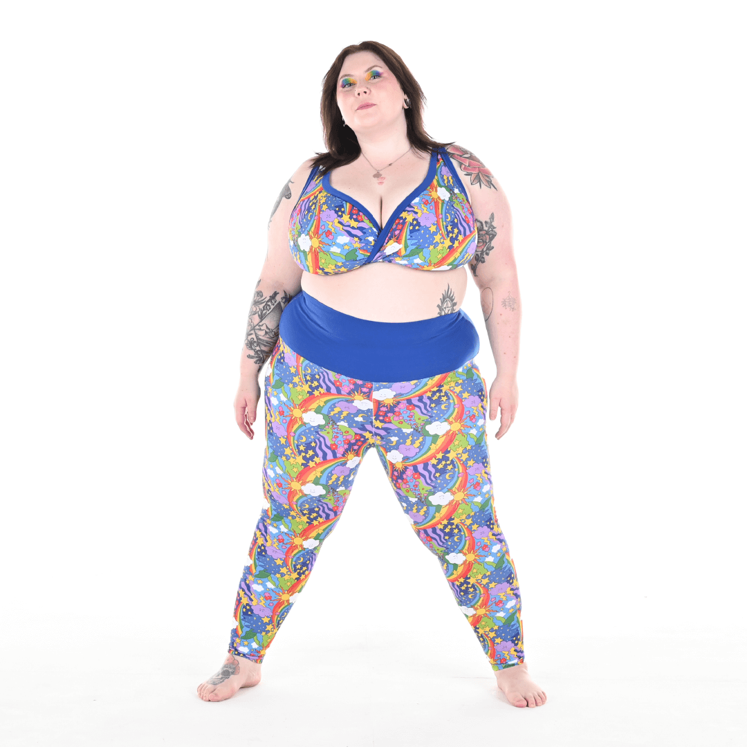 Molly is wearing retro rainbow leggings and bra