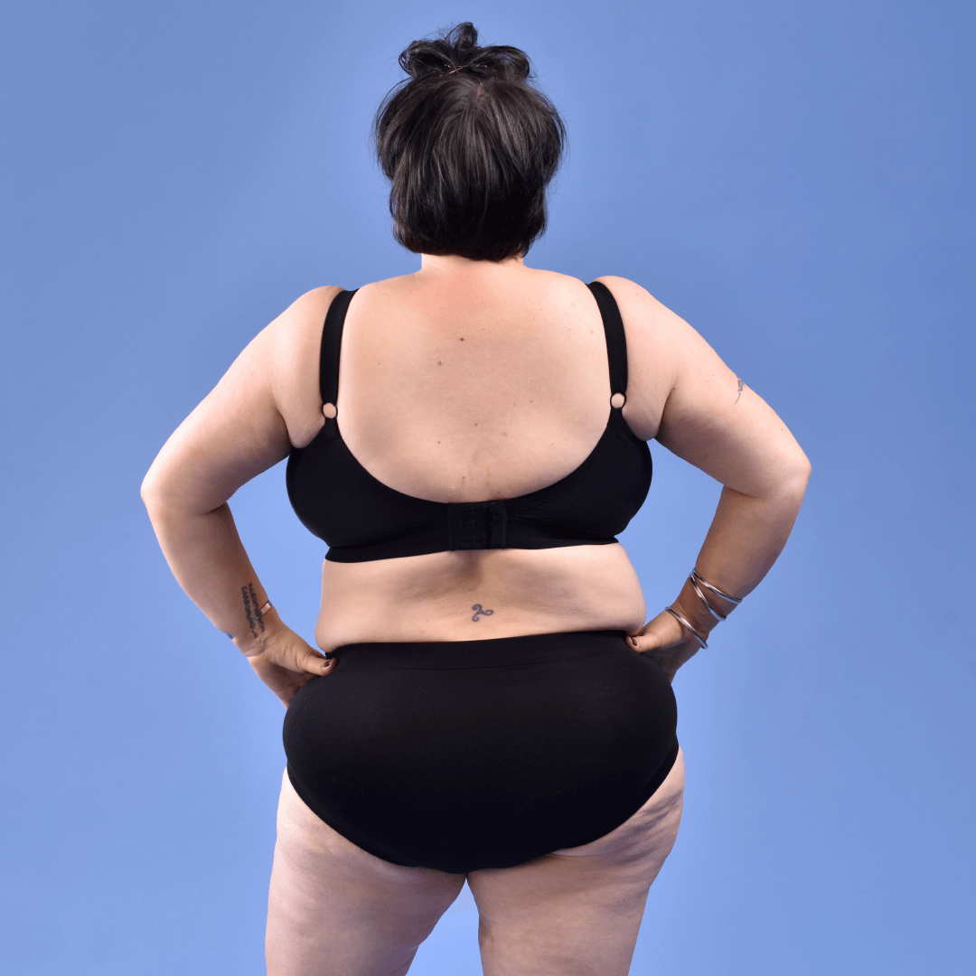 Back shot of black Flexi size bra showing adjustable fastener and straps