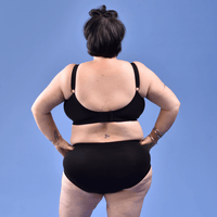 Back shot of black Flexi size bra showing adjustable fastener and straps