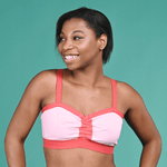 Precious is wearing a non-wired Flexi-Size Candy Floss pink bra