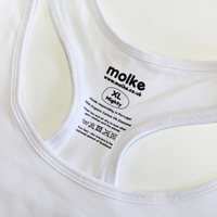 Close up of printed sensory friendly label on white racerback bralette