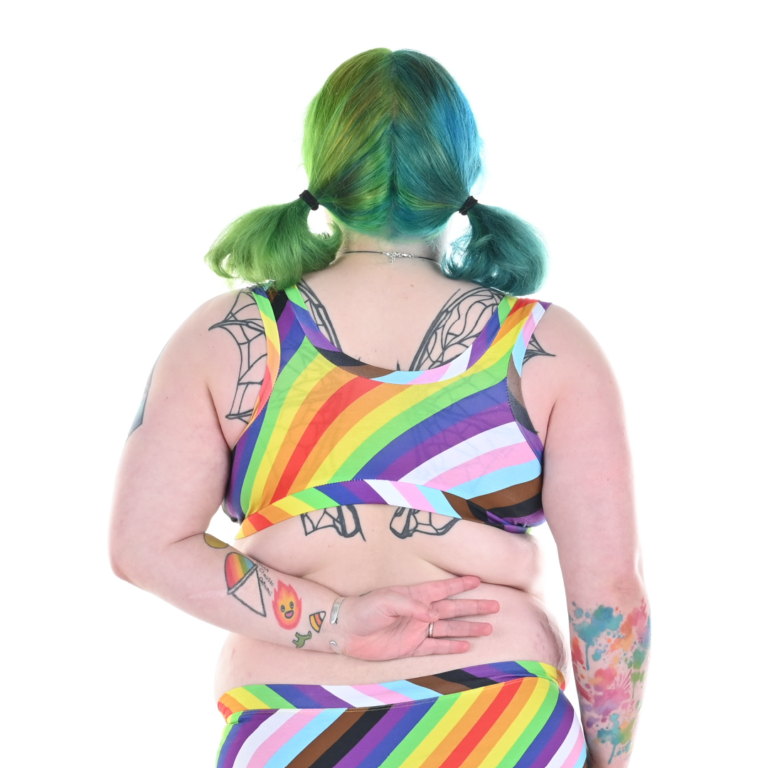 Back view of Autumn wearing a pull on cotton rainbow bra