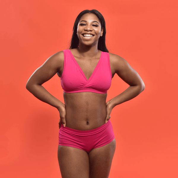 Precious is wearing a raspberry pink non underwired Molke bra and briefs