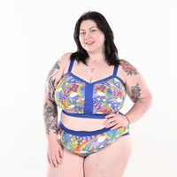 Molly is wearing a colourful rainbow non wired bra