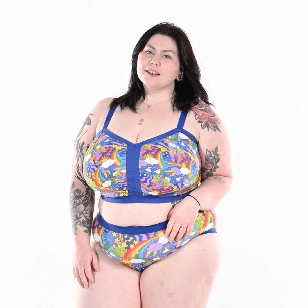 Molly is wearing a retro rainbow bra and briefs