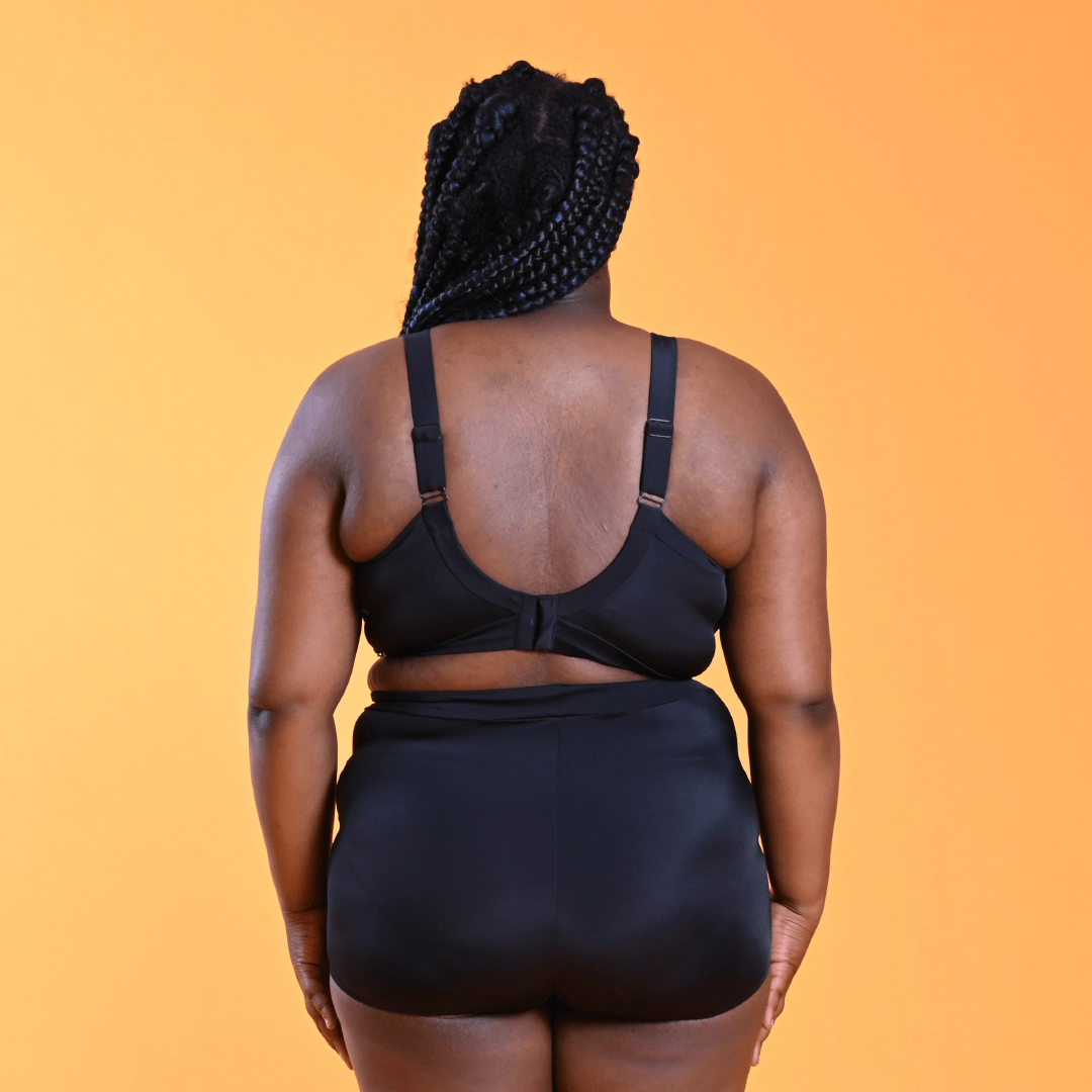 Back view of Kayla wearing swim bra and shorties