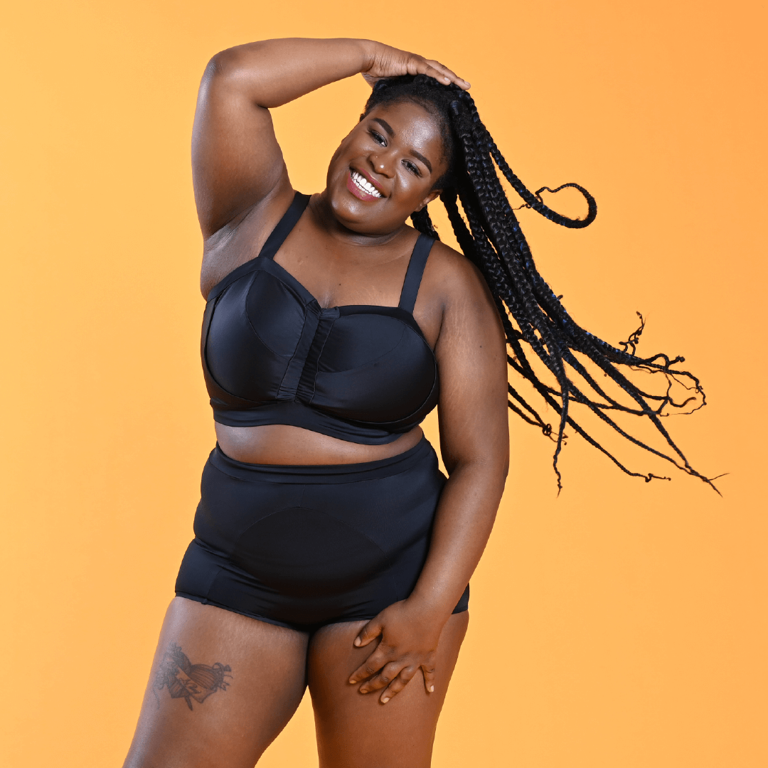 Kayla is wearing a non-wired black bikini and swim shorties