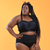 Kayla is wearing high rise black swim briefs and bikini top