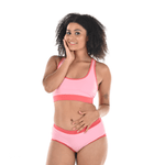 Tinashe is wearing a candyfloss pink bralette and briefs