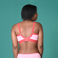 Back view of Precious wearing a candyfloss pink flexi size bra and briefs