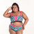 Kayla is wearing a leopard print underwear set in teal, black and hot pink