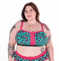 Molly is wearing a teal and pink leopard print wireless bra