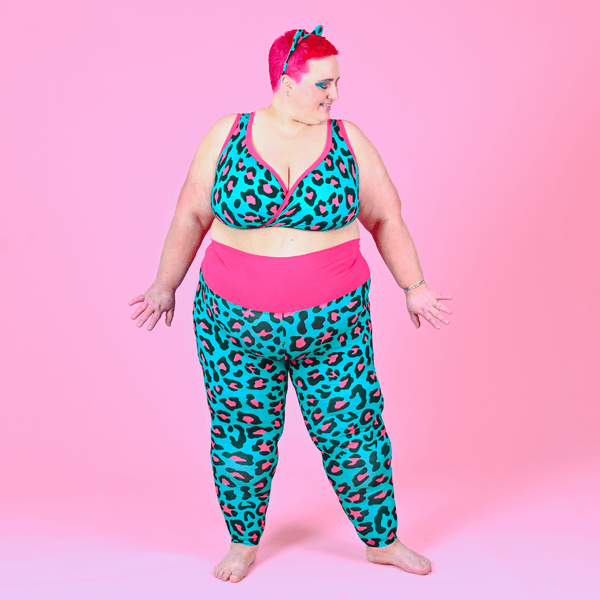 Estelle is wearing teal and pink leopard print bra and high waist full length leggings