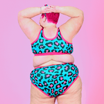 Back view of Estelle wearing a hot leopard underwear set with high waist briefs