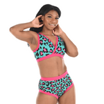 Precious is wearing a Teal, black and pink leopard print bra and period pants