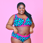 Kayla is wearing a teal and pink leopard print underwear set