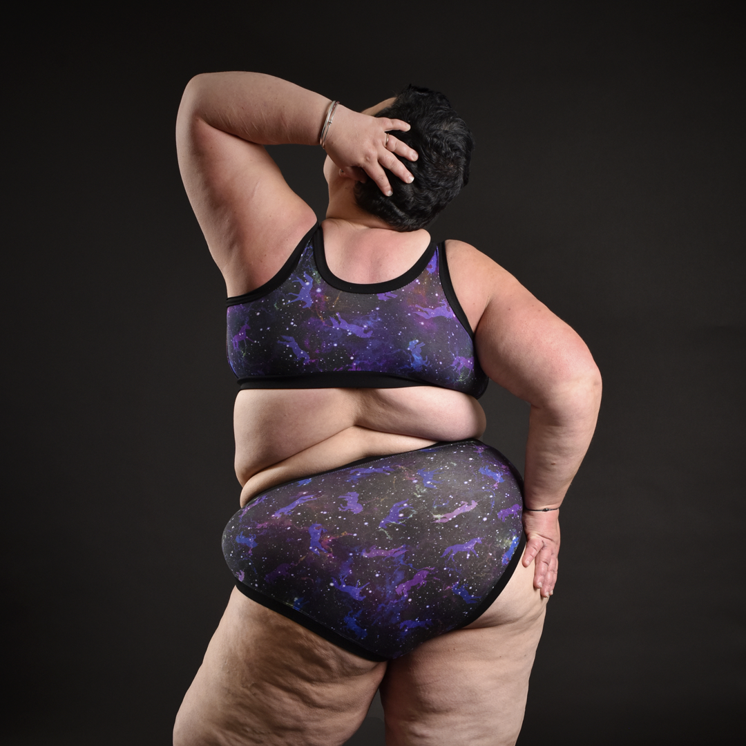 Back view of Estelle in non-wired Universe bra and high rise briefs