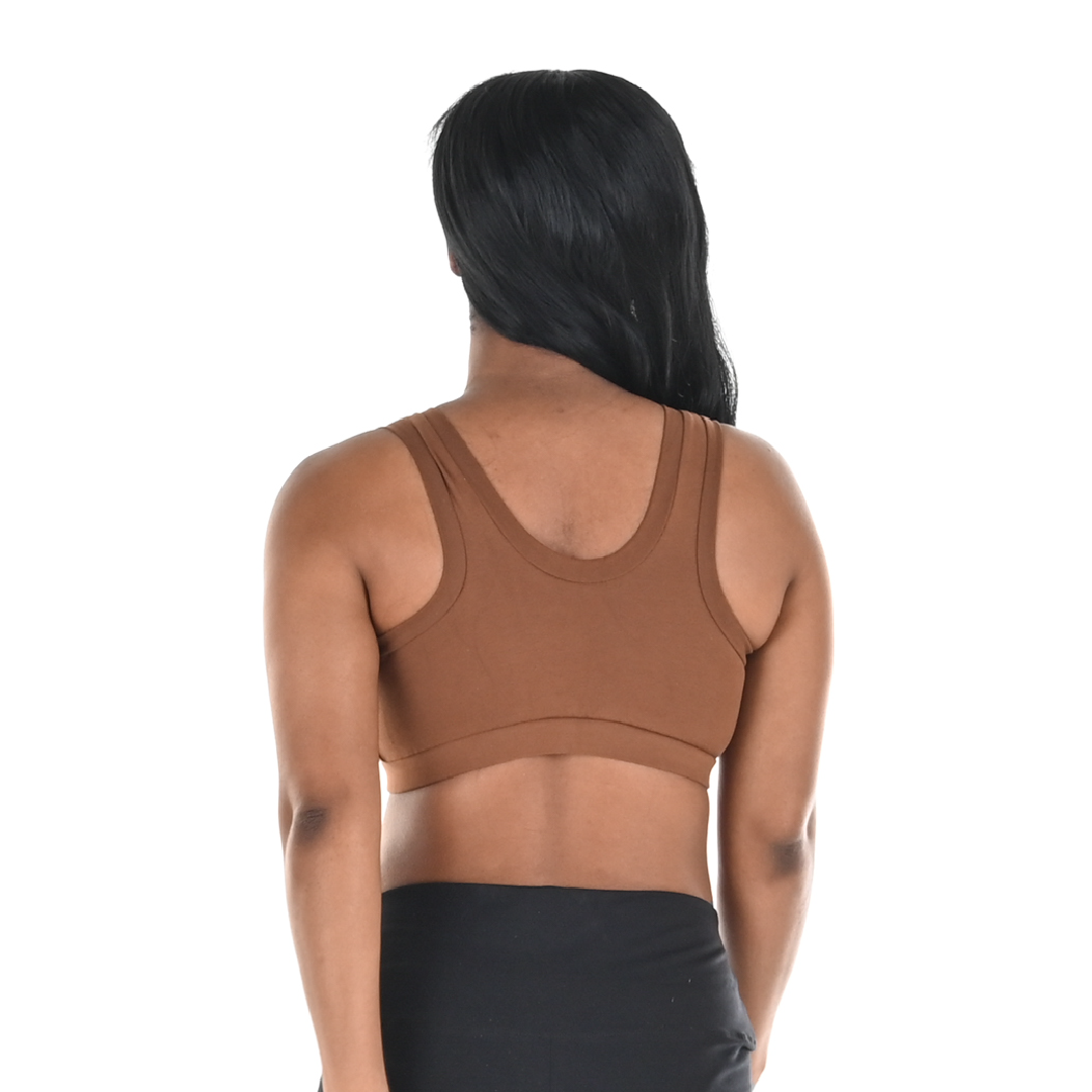 Back view of Precious wearing a brown skin tone bra