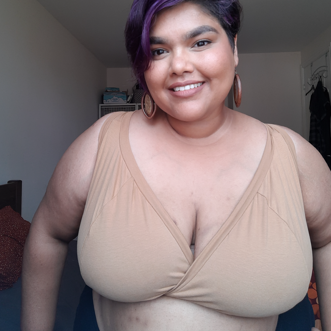 Anu is wearing a brown nude bra