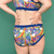 back view of taylor wearing retro rainbows underwear