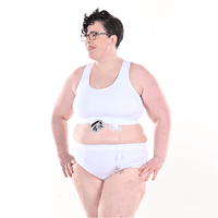 Fiona is wearing a fuller bust white bralette and high rise white briefs